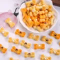 Close-up of cute resin bone biscuit charms with paw prints for DIY hair clips and crafts. - Multicolor