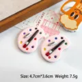 Detailed close-up of pink miniature resin artist palette for DIY crafts, 4.7x3.6cm size - Light Pink
