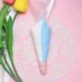 Close-up of 100g double-color white and blue piping bag cream glue for DIY clay crafts - 100g Bag (With 2 Nozzles) / White + Blue