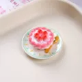 Detailed close-up of a resin miniature strawberry tart on a plate with a gold spoon - Strawberry Egg Tart Plate