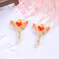 Detailed resin magic wand charms featuring a red heart and gold wings for DIY jewelry - Red Heart Magic Wand