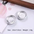 Macro view of two miniature silver dinner plates for dollhouse crafts and DIY projects - Round Plate Style (MG-257)