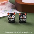 Nahaufnahme von Mini-Eulenfiguren aus Harz mit Größe 1,2x1,5 cm und Gewicht 1,7 g - Schwarz Eule