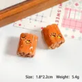Dettaglio di ciondoli a forma di pane in resina per accessori fai-da-te, 1,8x2,2cm - 1,8x2,2cm / Caramel Towel Roll