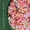 Close-up of mixed colorful polymer clay slices featuring hearts, flowers, and snowflakes - Cherry Blossom Heart / 50g Pack