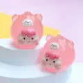 Macro view of two cute pink jelly resin cartoon animal figurines for DIY crafts - M / Pink Monkey