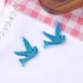 Vibrant blue resin swallow bird charms for creative DIY jewelry and hair accessories. - Blue
