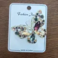 Detailed view of a vintage alloy butterfly brooch adorned with multi-colored rhinestones - Hollow Butterfly (7)