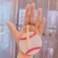 Acrylic baseball keychain pendant with a mini wooden bat charm and printed softball - Keychain / 5cm Diameter