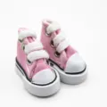 Detailed macro view of 3.5cm pink canvas sneakers for Barbie and Sharon doll accessories - Pink