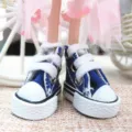 Detail of 3.5cm miniature blue canvas shoes for dolls with white laces and rubber soles - Sapphire Blue