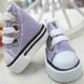 Macro view of purple 3.5cm miniature canvas shoes for dolls and keychains - Purple