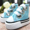Macro view of mini 3.5cm light blue canvas shoes for dolls with detailed white laces - Light Blue
