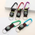 Five colored carabiner compass keychains with camouflage straps and metal rings. - 15.5cm / Camouflage