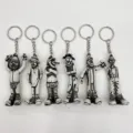 Set of 6 Halloween skeleton clown keychains with distressed black and white finish - Zombie Style A