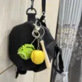 Sports-themed baseball keychain set with yellow ball, green glove and wooden bat - 黄球绿色