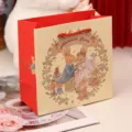 Sacchetto regalo di matrimonio in carta con graziosa illustrazione di coniglietti romantici. - Sacchetto di carta per matrimonio con coniglietto