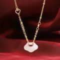 Elegant gold-plated clavicle chain with a white chalcedony auspicious cloud safety lock pendant - Traditional Lock Pendant Necklace / Gold