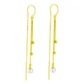 Elegante lange gouden kwastjes oorbellen met ronde witte parelhangers. - Lange Kwast Parel Stijl / Goud
