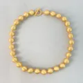 Elegante variante de collar de cuentas de oro mate con cierre OT vintage y textura cepillada - Collar Corto de Cuentas / Diámetro aprox 12mm Longitud aprox 43cm / Dorado