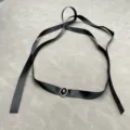 Detailed view of an elegant minimalist black ribbon choker with a black oval gemstone - Black Ribbon (ML2415) / Black