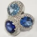 Eleganter Silberring mit blauen ovalen Edelsteinen im Farbverlauf und Heiligenschein - US Größe 6 / Platin Blau