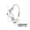 Close-up detail of the silver leaf open ring, sparkling cubic zirconia stones, exquisite design. - Silver White