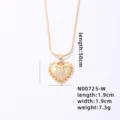 Detail shot of golden heart pendant necklace featuring delicate rhinestone letter W design. - Letter W