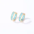 Closeup of stylish gold hoop earrings featuring turquoise square inlays and beaded edges. - 16K Sky Blue