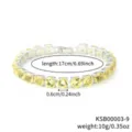 Detailed close-up view of the sparkling yellow rhinestone tennis bracelet link structure. - White K Yellow Rhinestone