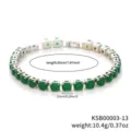 Detailed view of the elegant single row green zircon tennis bracelet with silver setting. - White K Green Stone