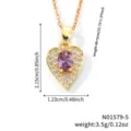 Close-up view of gold heart pendant necklace with purple stone and zircon inlay - Purple Gold Tone (N01579-5)
