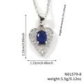Macro detail of heart-shaped blue zircon necklace showing size and weight specifications. - Blue Silver Tone (N01579-8)