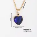 Close-up detail of the gold-plated blue heart cubic zirconia necklace pendant and chain. - Royal Blue Heart Zirconia (N00486-10) / Gold