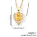 Macro detail of gold plated heart pendant necklace with yellow zircon and dimensions. - Yellow-Gold Tone (N01579-13)