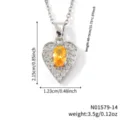 Close-up detail of the heart-shaped pendant necklace showing precise measurements and weight - Yellow-Silver Tone (N01579-14)