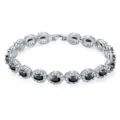 Close-up of silver-toned bracelet featuring oval black stones with halo zircon accents. - Oval Black Zirconia (KSB00053) / White Gold