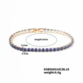 Close-up detail of the luxury blue crystal tennis bracelet with shimmering gold links. - 19cm / KC Royal Blue