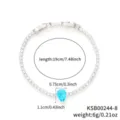 Macro view showing detailed dimensions of teardrop blue stone tennis bracelet. - Silver Sea Blue Zirconia