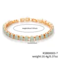 Gold-tone tennis bracelet featuring light green round zircon stones and extension clasp. - Gold Cyan Stone