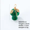 Macro view of wire wrapped green malachite mushroom pendant with size specifications - Pendant Only (Without Chain) / 1 Piece/Pack / Gold Green
