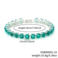 Green round cubic zirconia tennis bracelet with silver finish and extension chain. - White K Green Rhinestone