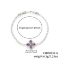 Minimalist silver-tone four-leaf clover bracelet with purple cubic zirconia stones. - White K Purple