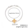 Elegant silver-finish tennis bracelet featuring an orange zirconia four-leaf clover charm - Silver and Yellow