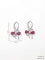 Orecchini a cerchio a forma di fiocco in argento con pietre rosa, 2,6cm altezza, 1,5cm. - Rosa