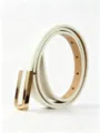 Detailed view of women's white skinny PU leather belt featuring a U-shaped gold buckle - 100cm*1.5cm / White