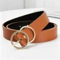 Close-up detail of the brown PU leather belt featuring a stylish double round golden buckle. - Brown Gold Clasp