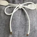White thin leather belt for women, elegant knotted dress waist accessory for sweater coat. - White