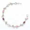 Elegant zilveren wijnstokarmband met roze en paarse stenen in fijne marquise-slijping - Zilver met Paarse en Roze Strass