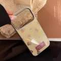 Detailed view of cream-colored iPhone case with cute teddy bear pattern and metallic frame. - iPhone 17 Pro Max / Silver-edged Magnetic Gilded Teddy Bear